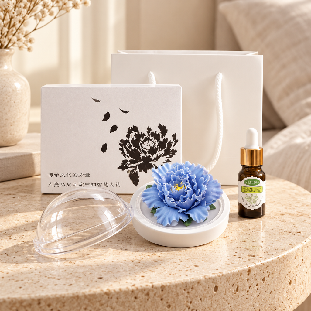 Blue ceramic peony flower and oil gift set, compact version — gift set styled on a bedside table in a beige room