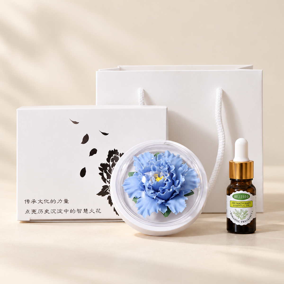 Blue ceramic peony flower and oil gift set, compact version — complete gift set on a beige background