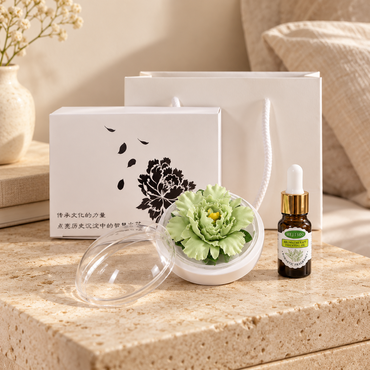 Green ceramic peony flower and oil gift set, small version — gift set styled on a bedside table in a beige room