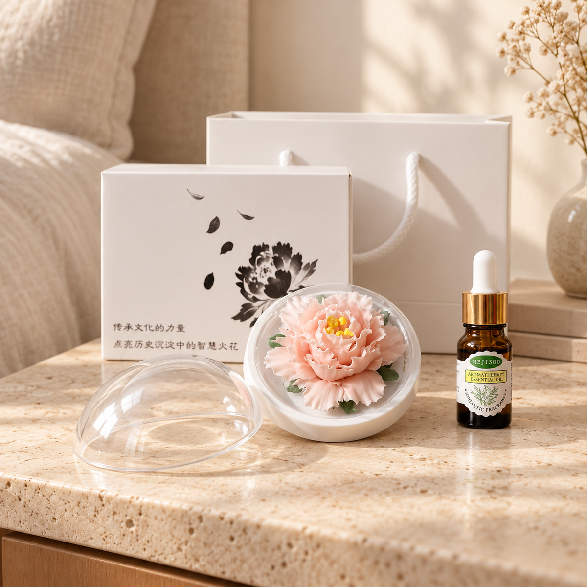 Peach ceramic peony flower and oil gift set, compact version — gift set styled on a bedside table in a beige room