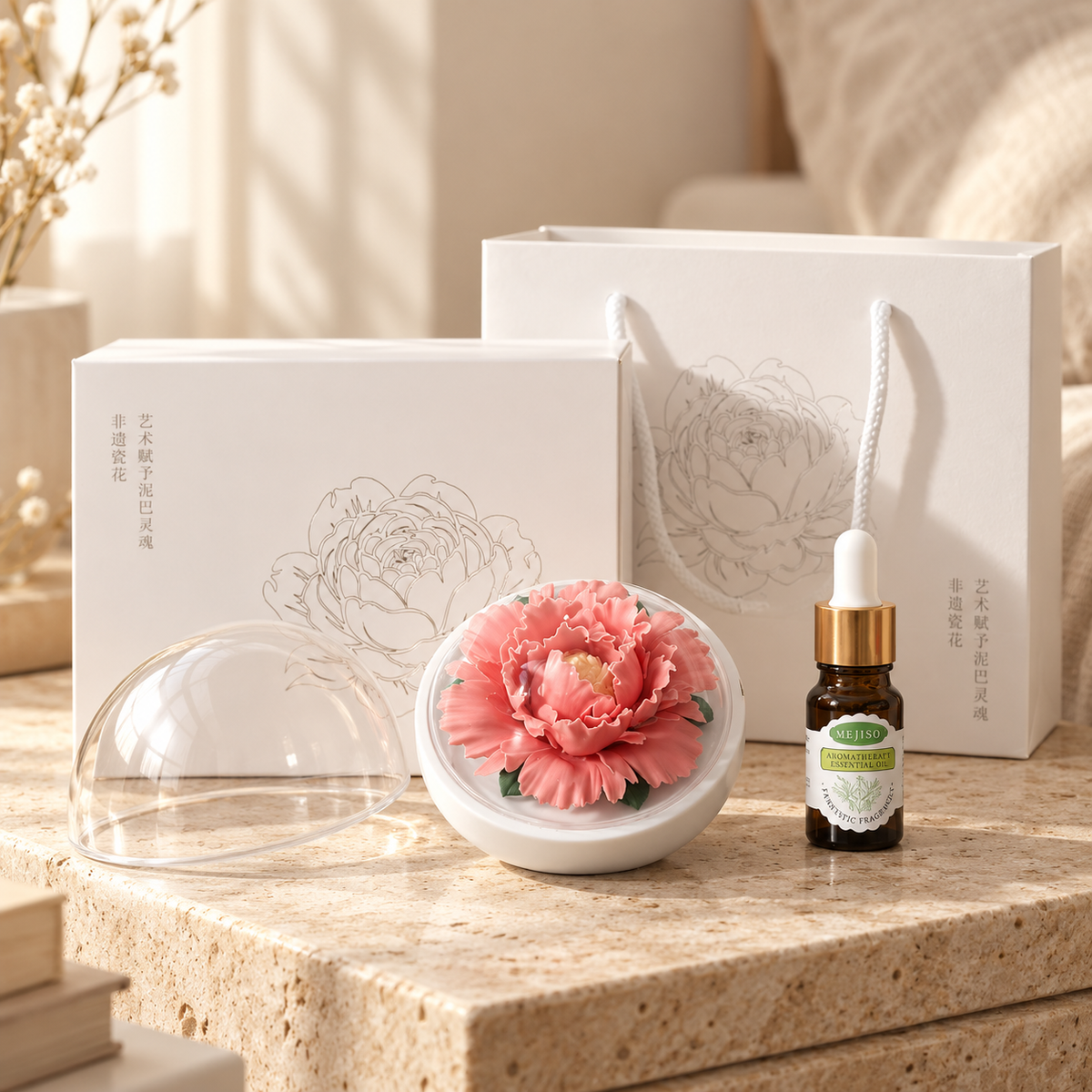 Rose Red ceramic peony flower and oil gift set, large version — gift set styled on a bedside table in a beige room