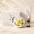 Yellow ceramic peony flower and oil gift set, small version — complete gift set on a beige background