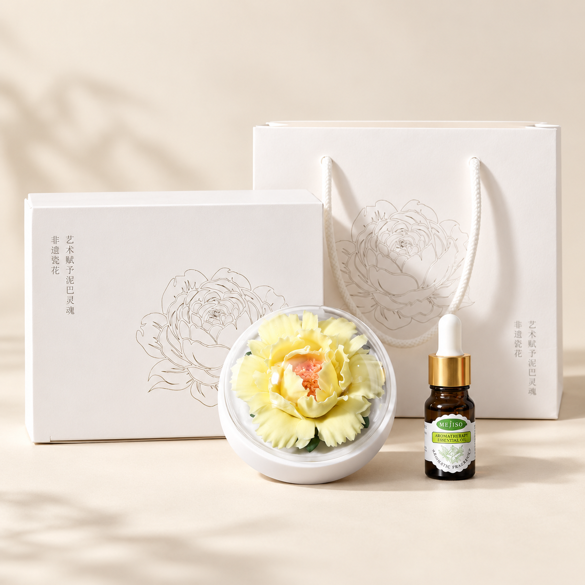 Yellow ceramic peony flower and oil gift set, large version — complete gift set on a beige background